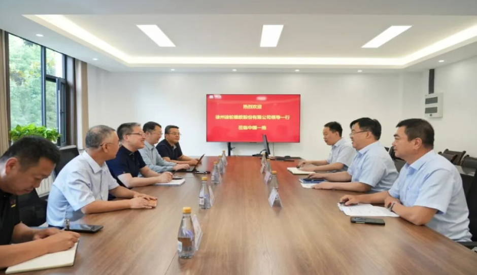 徐轮橡胶与中国一拖开展合作交流